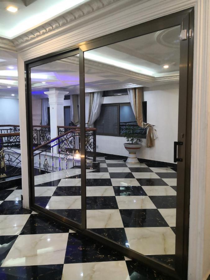 Residence Palais Du Stade 科托努 外观 照片