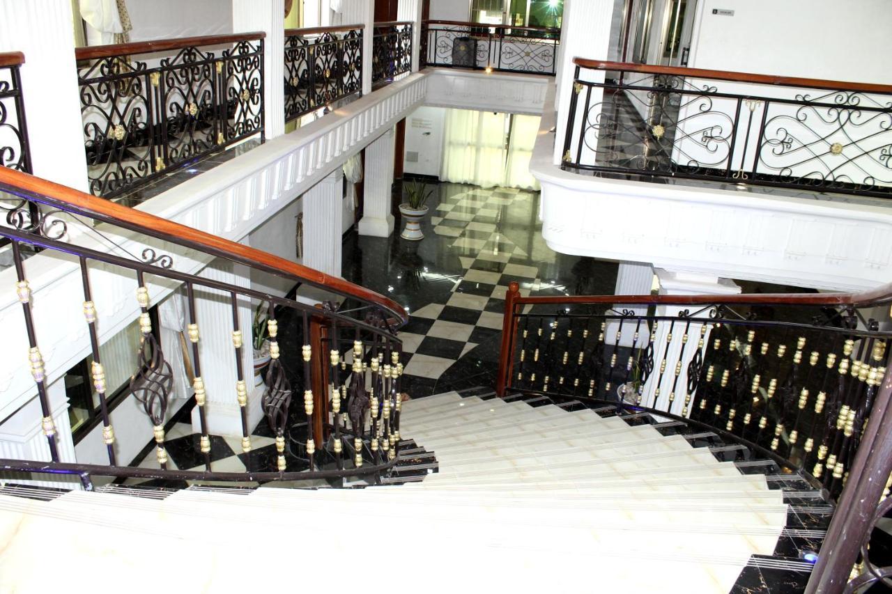 Residence Palais Du Stade 科托努 外观 照片