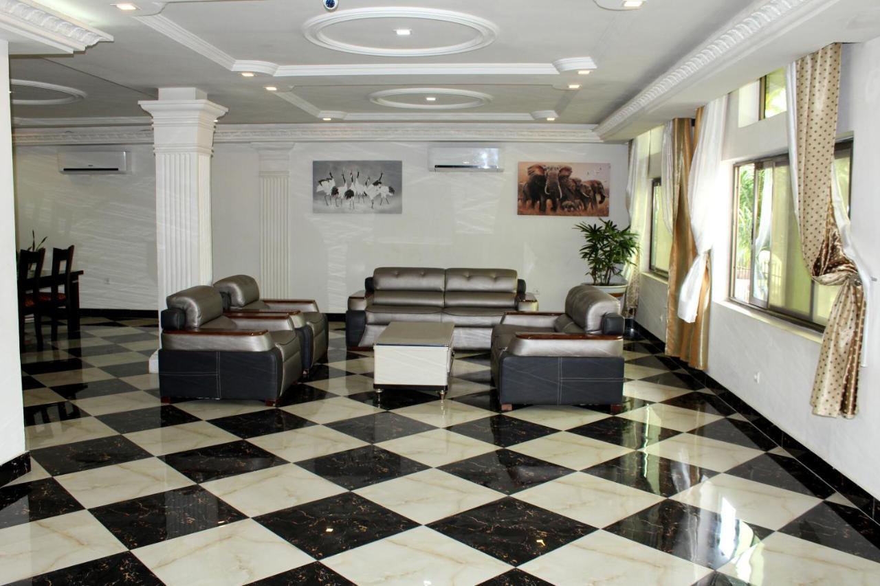 Residence Palais Du Stade 科托努 外观 照片